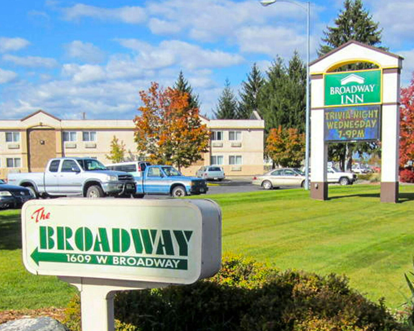 Broadway Inn exterior with main signage and parking area at 1609 W Broadway