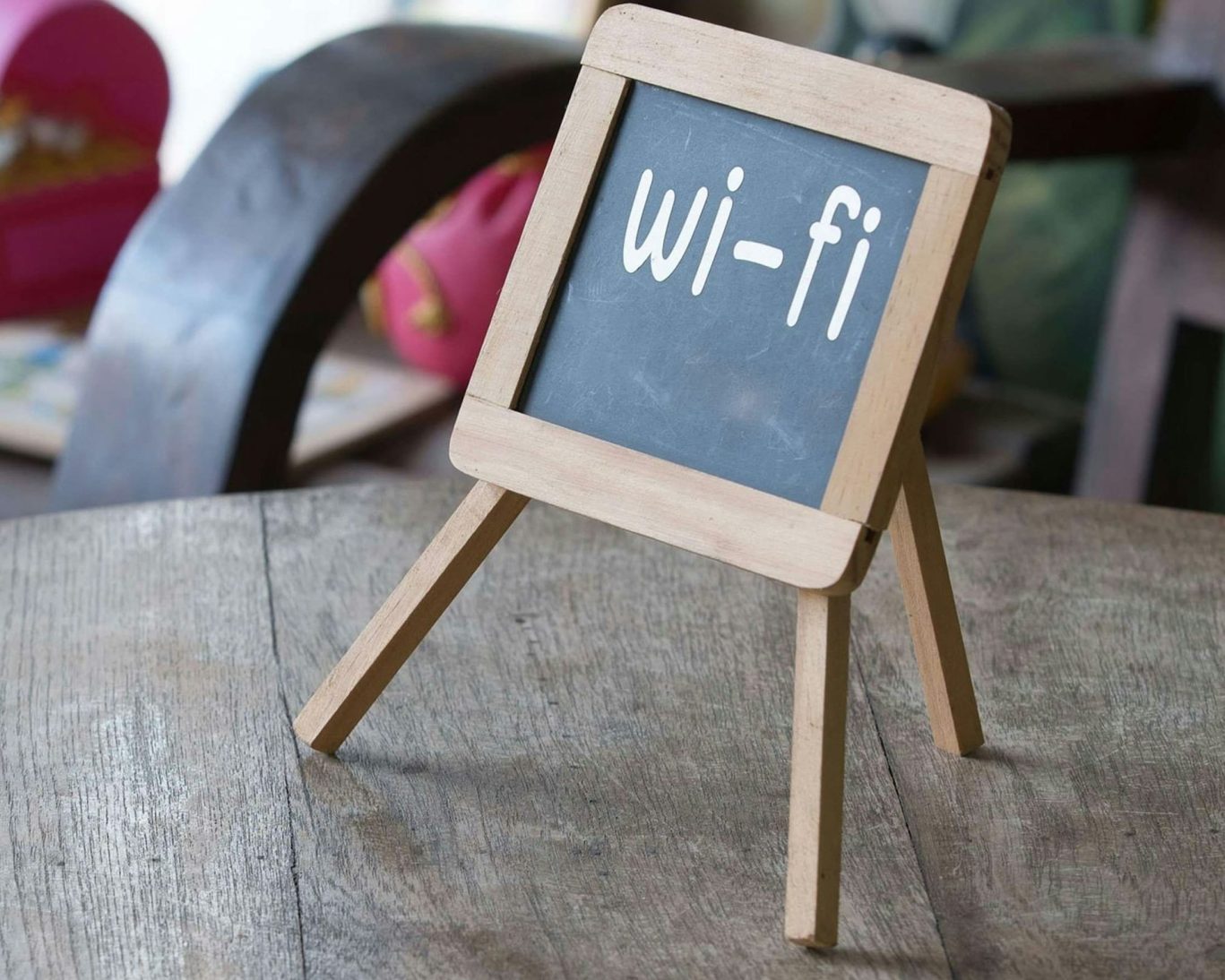 Complimentary Wi-Fi sign at Golden Wheat Motel for guests.