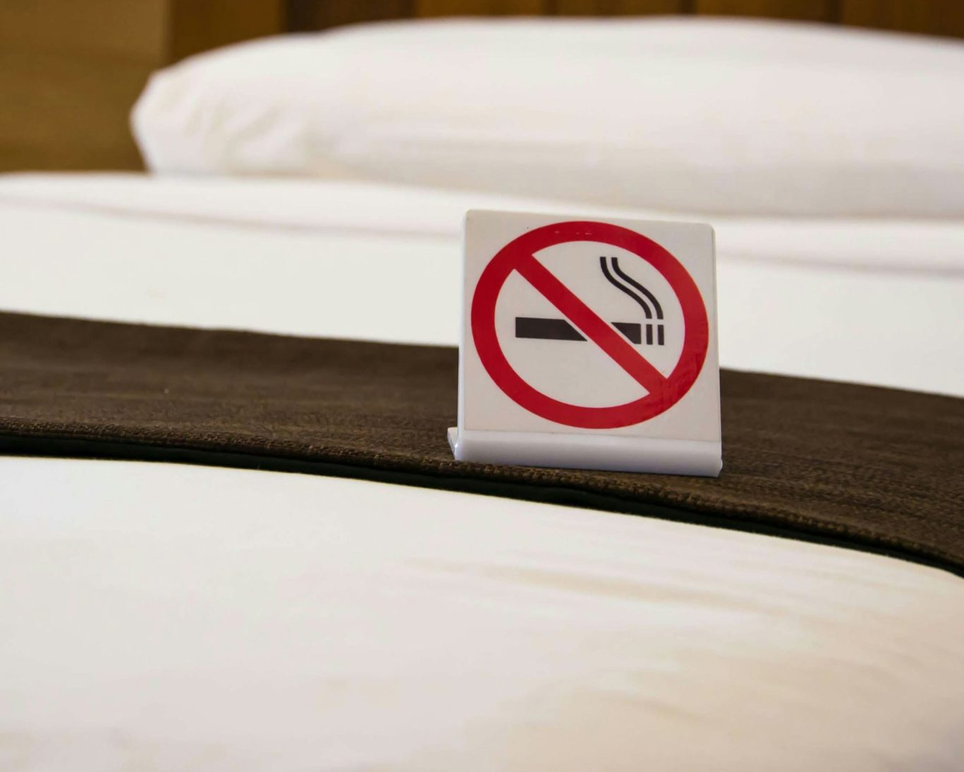Non-smoking room signage at Golden Wheat Motel for guest comfort.