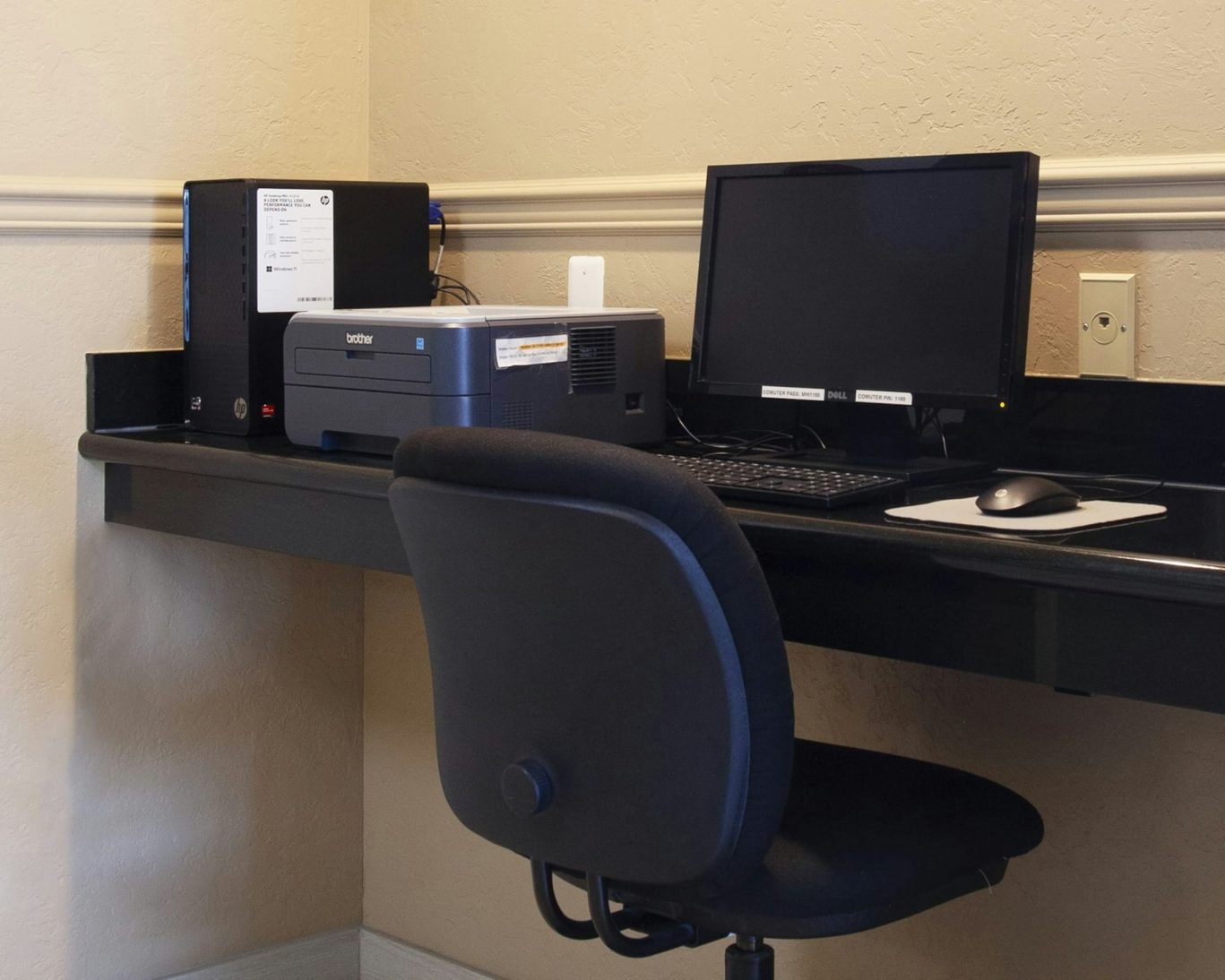 Hotel business center with computer and printer access at Mountain Home Inn Idaho.