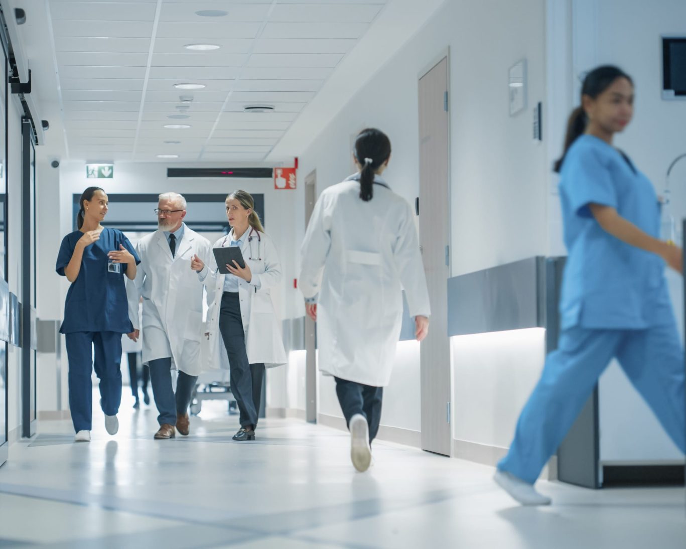 Medical professionals walking through a hallway at Shannon Medical Center, a major healthcare provider in San Angelo, Texas.