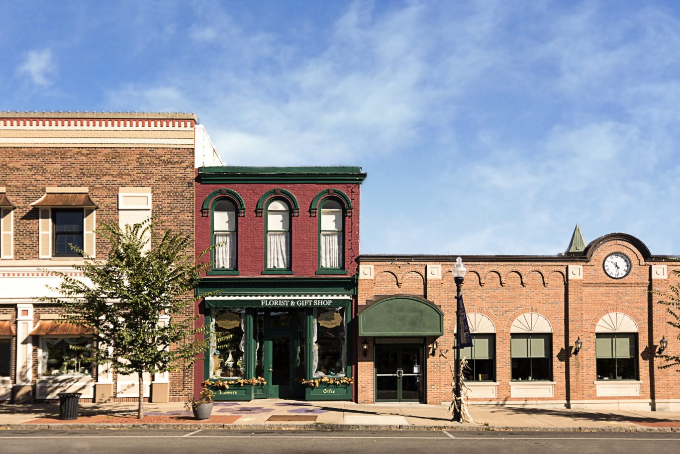 Charming historic main street with small-town storefronts in Michigan.